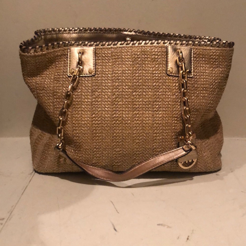 This is a Taupe Michael Kors purse